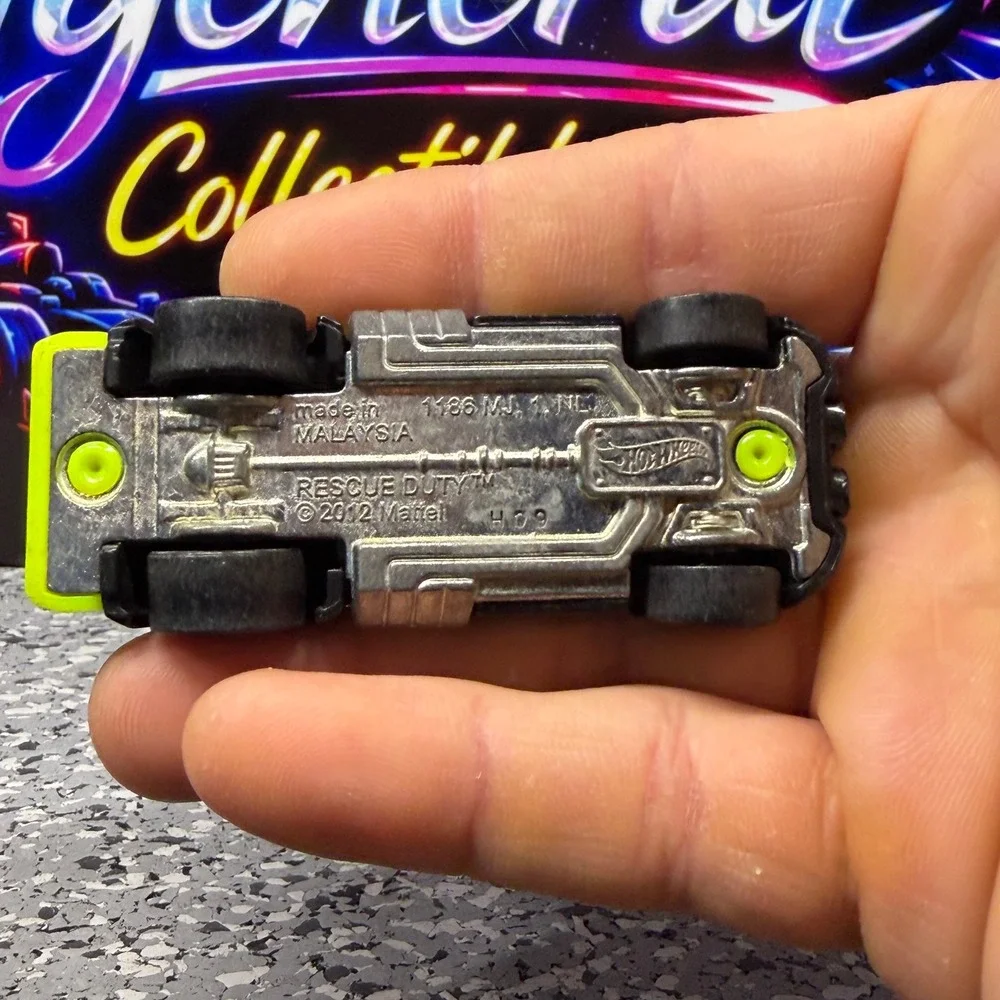 Hot Wheels Rescue Duty Neon Lime Green Track 1st Response Diecast Truck 2012